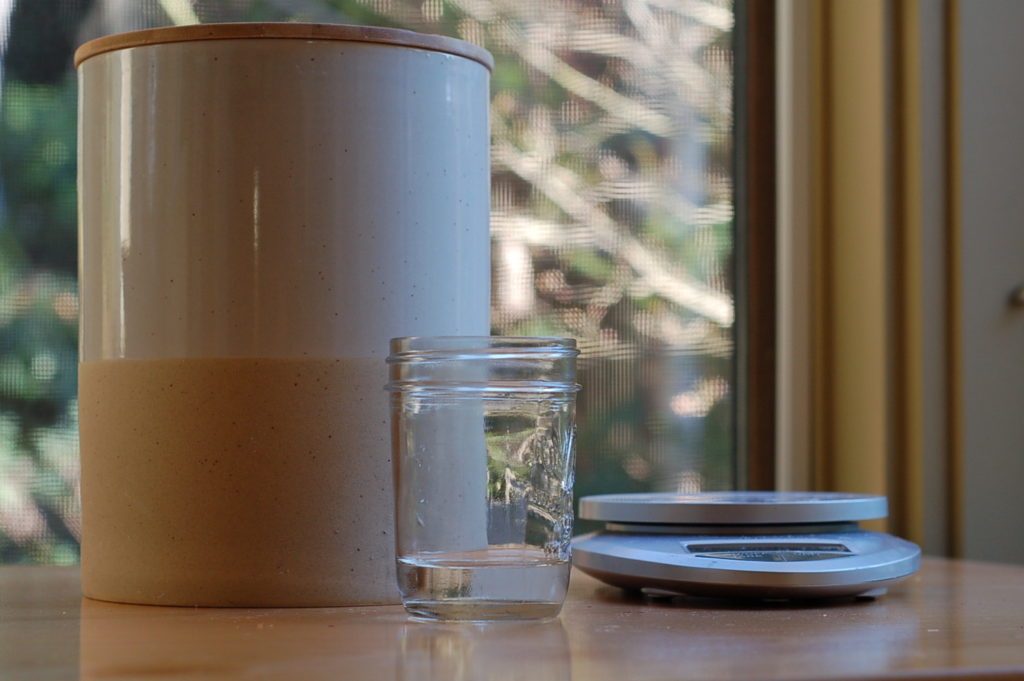 Scale, water, flour - sourdough starter ingredients