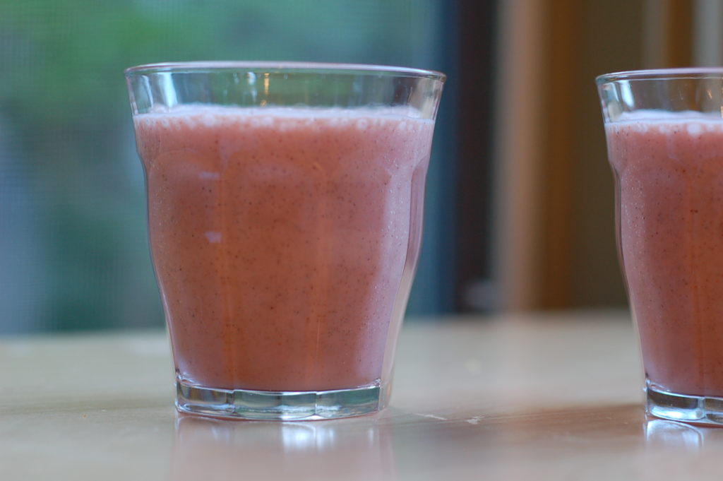 Two glasses of pink smoothie