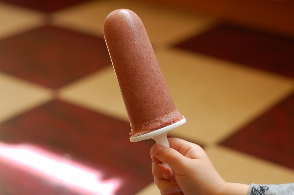 Pink smoothie popsicle