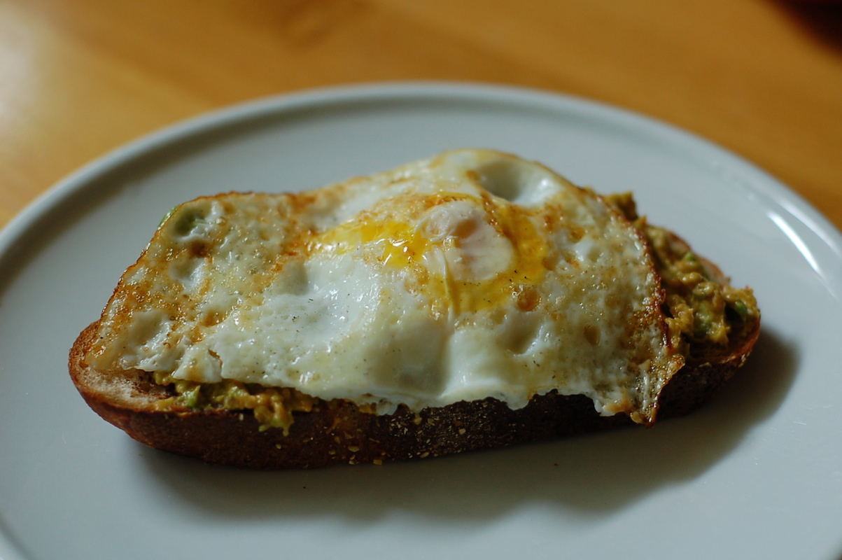 My favorite, perfect lunch: eggy avocado toast with Vegemite and sambal oelek