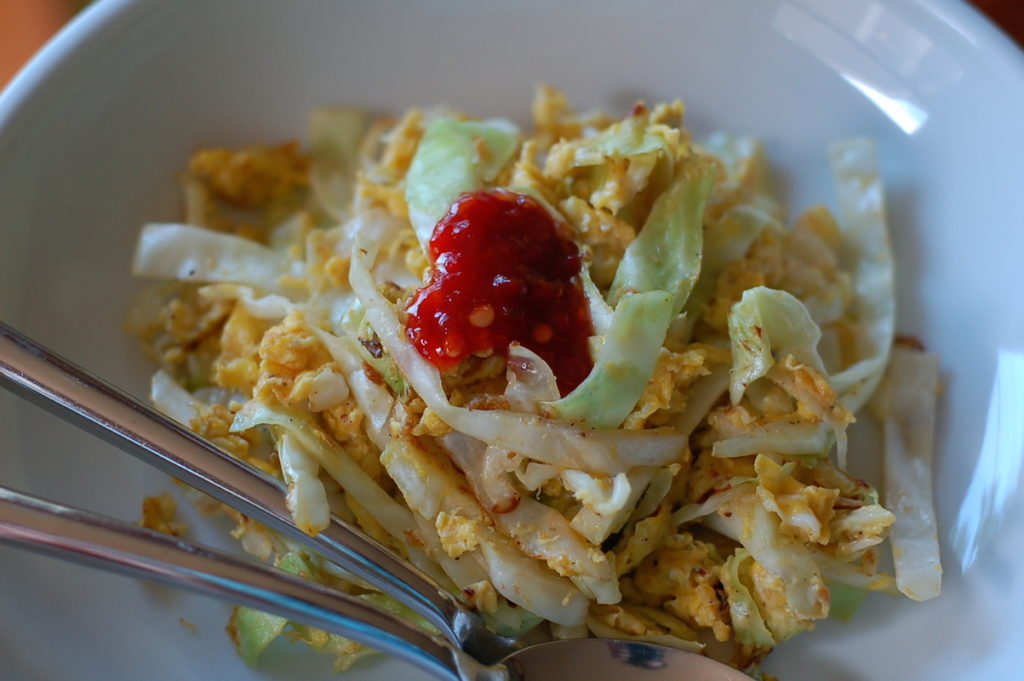 Cabbage and eggs with sambal oelek